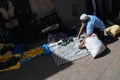 A local merchant sets up his items for sale in Morocco.