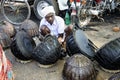 A local musician maintained and repaired traditional drums in the roadside...