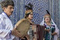 Local musicians playing musical instruments and singing, in Khiva, Uzbekistan