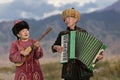 Local musicians in traditional costumes, Issyk Kul Lake, Kyrgyzstan