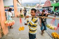 Local native Timorese men, street vending fruits and vegetables. Dili, East Timor.