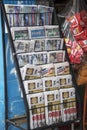 Local newspaper on a shelf for sale on the street in Johor Bahru Royalty Free Stock Photo