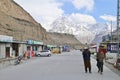Local Pakistani Village with Majestic Snowy Mountains on the Way to Khunjerab Pass