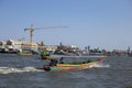 Local passenger ship for tourism sailing with crane