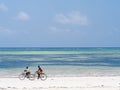 Local people biking in Zanzibar.