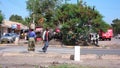 Local people coming from and going to the daily market in the town center of Moshi