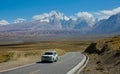 Local people driving across the breathtaking plains of the Himalayan Plateau.