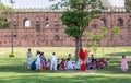 Local people gathering at the park outside the Badshahi Mosque in Lahore