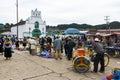 Local people in a market in front of the Church of San Juan in the town of San Juan Chamula, Chiapas, Mexico