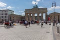Local people and tourists at the Brandenburger Tor Brandenburg Gate in Berlin. Germany.