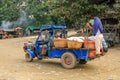 Local people riding in a truck at Ayeyarwady river port in Mandalay, Myanmar Royalty Free Stock Photo