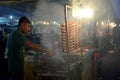 Local people sell barbeque or grilled chicken in Kota Kinabalu night market