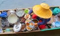 Local people sell fruits, food and souvenirs on boats at Damnoen Saduak Floating Market in Ratchaburi District, Thailand. Famous