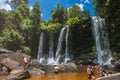 Local people swimming at Phnom Kulen waterfall in Phnom Kulen National Park , Cambodia Royalty Free Stock Photo