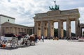 Local People and tourists at the Brandenburger Tor Brandenburg Gate. Berlin, Germany.