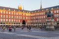 Local people and tourists at the Plaza Mayor (Town square) in the heart of Madrid, Spain. Royalty Free Stock Photo