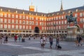 Local people and tourists at the Plaza Mayor (Town square) in the heart of Madrid, Spain. Royalty Free Stock Photo