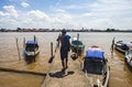 Traditional boat in the middle of Musi River, Palembang, Indonesia. Royalty Free Stock Photo