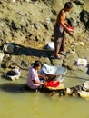 Local people washing clothes in Ayeyarwady river, Mandalay, Myanmar