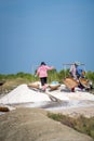 Local people working on the salt flats in Phetchaburi, Thailand, Asia