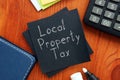 Local property tax is shown on the business photo using the text Royalty Free Stock Photo