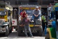 Local public transport jeepney and men. Banaue, Philippines.