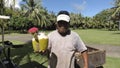 Local resident of Saipan offers to try coconut