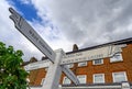 A local sign with pointing hands in Dulwich Village Royalty Free Stock Photo