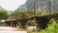 Local sling and concrete bridge in vangvieng laos Royalty Free Stock Photo