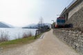 Local smiling train on the shore of Lago di Lugano, Switzerland