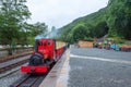 Local steam train of Llanberis Lake Railway seen on overcast day