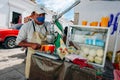 Local street life in the small town. seller of orange juice in mexico, chapas - dec, 2019 Royalty Free Stock Photo