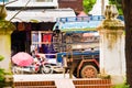 Local taxi on city street in Louangphabang, Laos. Copy space for text.