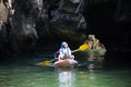 Local thai people guide paddle canoe boat of trip tour in sea ocean bring thai traveler women travel visit Prasat Hin Pan Yod in Royalty Free Stock Photo