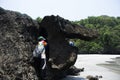 Local thai people guide take photo travelers thai women visit and portrait in Ao Talo Bean Tae gray sand beach on Ko Khao Yai Royalty Free Stock Photo