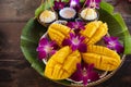 Local thai snacks dessert of specially cooked Mango and sweet glutinous sticky rice served on utensil retro vintage style tea time Royalty Free Stock Photo