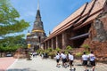 local Thai students visiting a famous temple, Wat Yai Chai Mongkol, on their fieldtrip Royalty Free Stock Photo