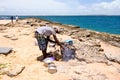 Local tour guide grilling barracuda in Mozambique