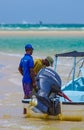 Local tour guides and sandy ocean view in Mozambique