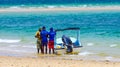 Local tour guides and sandy ocean view in Mozambique