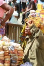 A local trader selling spices at a street market in Accra, Ghana