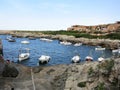 Menorca, Spain, July 24, 2014: Local traditional spanish boats in a little harbor