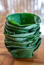 Local and traditional TRAY FOOD eco prackaging made to dish and bowl from banana leaf, arranged together like a tower Royalty Free Stock Photo