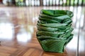 Local and traditional TRAY FOOD eco prackaging made to dish and bowl from banana leaf, arranged together like a tower Royalty Free Stock Photo