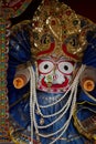 Local traditions and beliefs. Cropped closeup of a richly embroidered and decorated Indian religious icons.