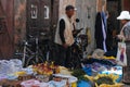 A local vendor sells items in the old madina in Moroccco.