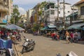 Local Vietnamese people walking on the street near Hoa Binh Market in Ho Chi Minh City, Vietnam Royalty Free Stock Photo