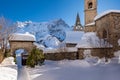 The local village of La Grave and its church with La Meije mountain peak in Winter. Hautes-Alpes, Ecrins National Park, Royalty Free Stock Photo