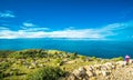 Local woman in national clothing walking on Island of Sun - Isla del Sol - on Titicaca lake, Bolivia Royalty Free Stock Photo