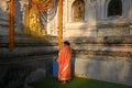 :A local woman is praying at Mahabodhi temple Bodh Gaya